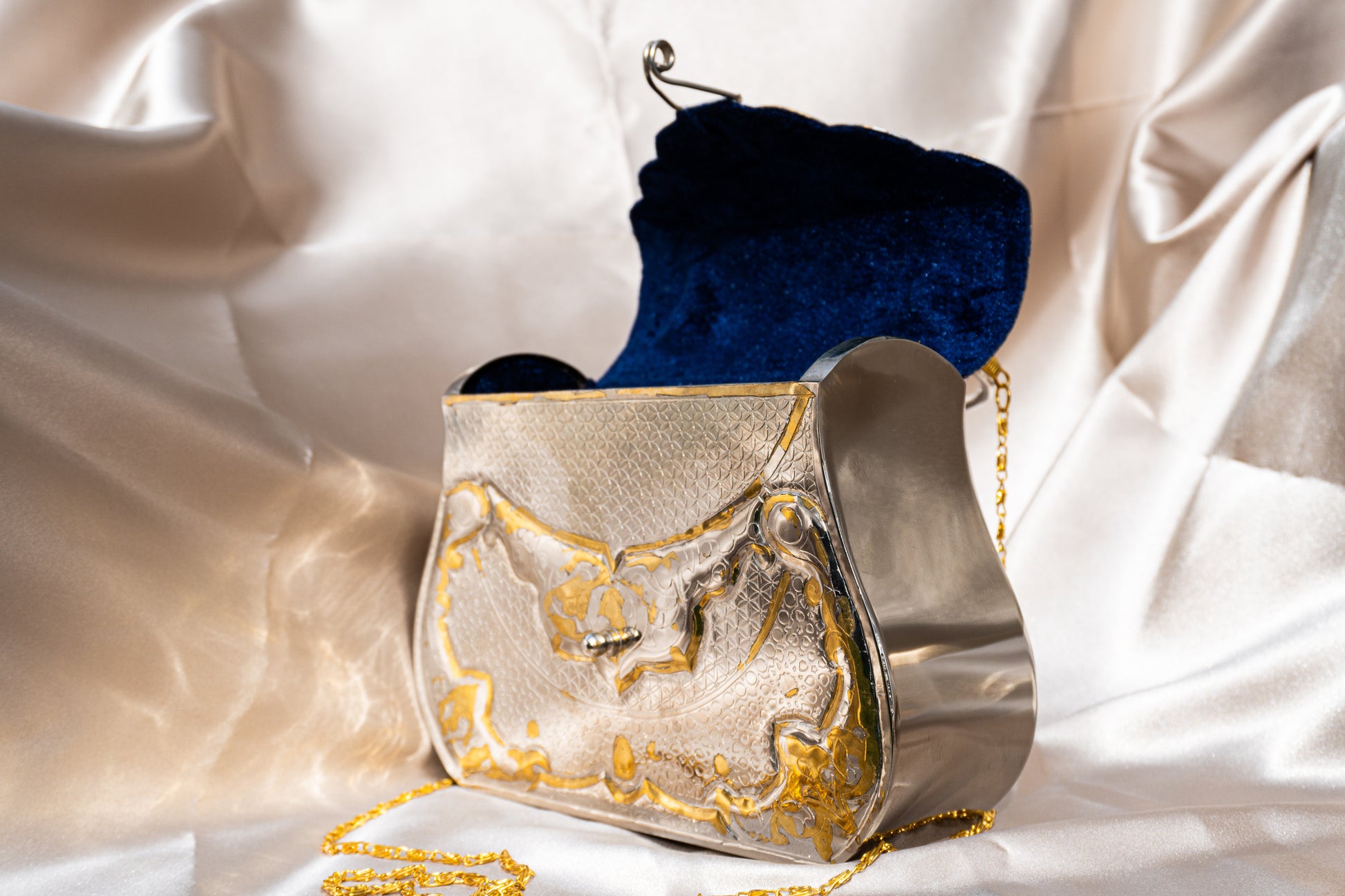 Ida - Handmade Bag, close-up side angle view with open  blue velvet interior 