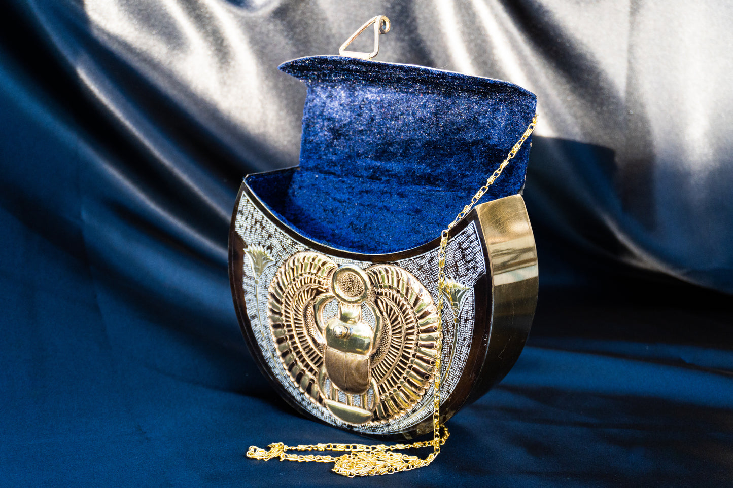 Salma - Handmade Bag, close-up side view with open blue velvet interior 